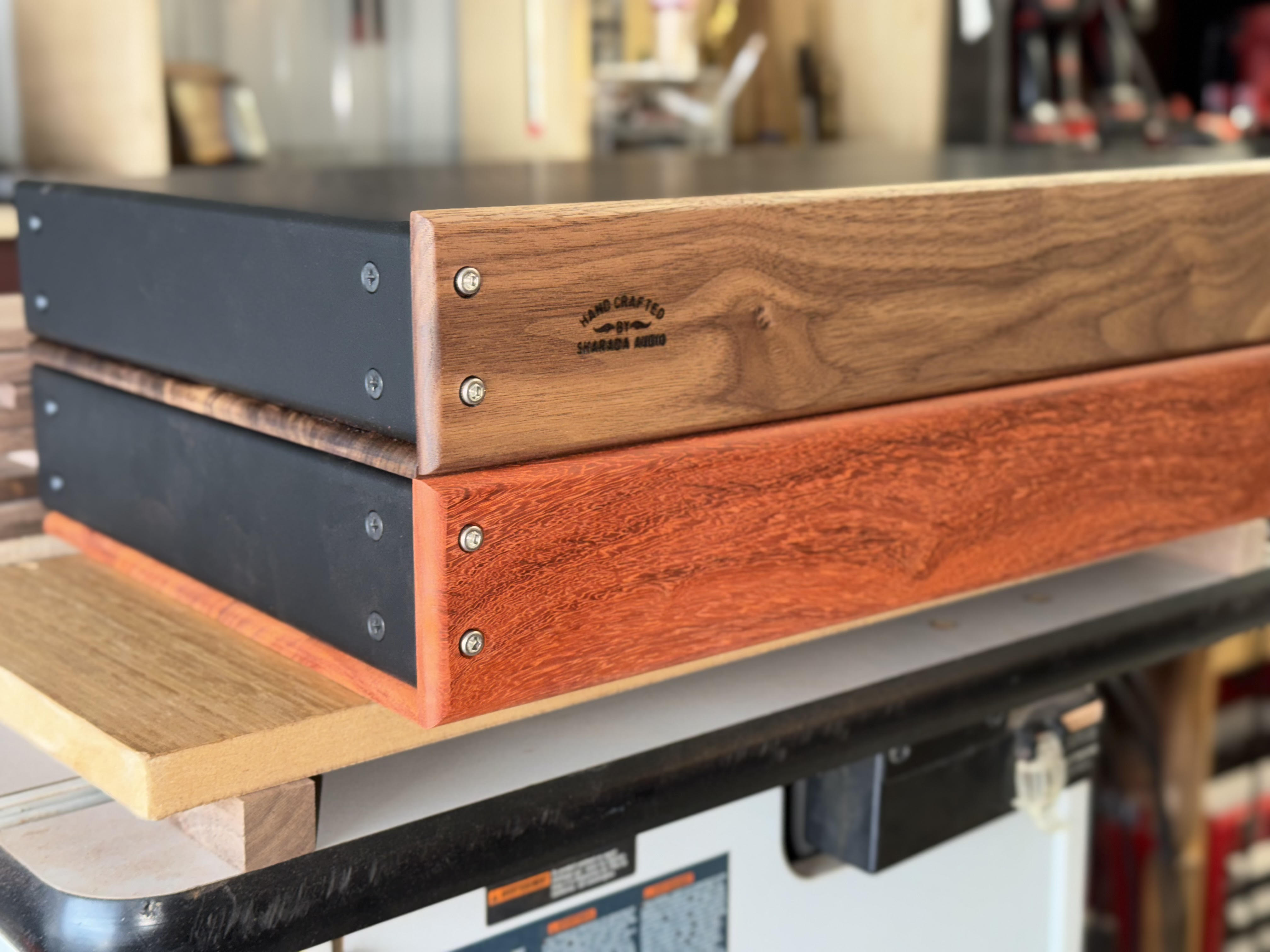 Wood enclosure detail view showing case proportions and grain