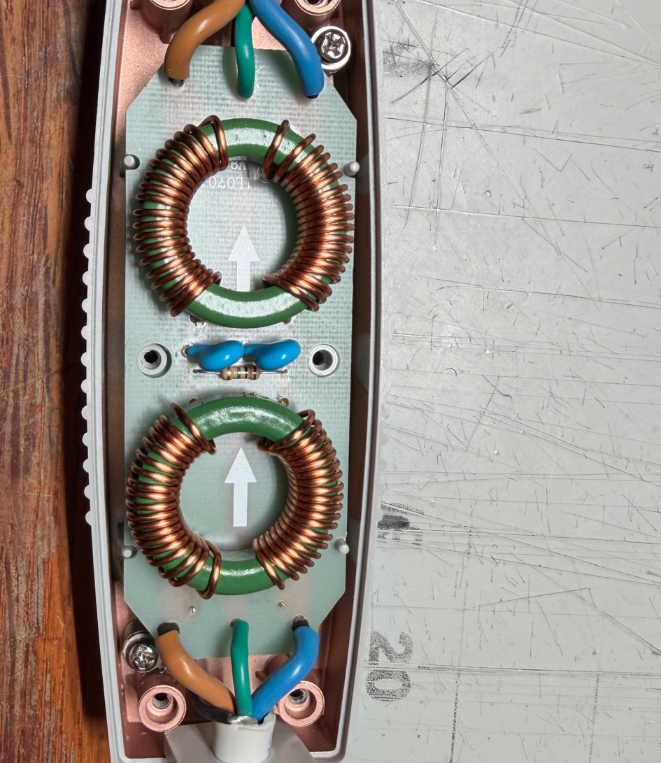 Custom AC mains EMI filter with two common-mode choke stages used in the power cable