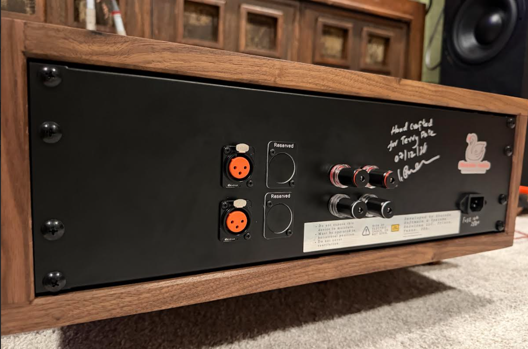 Sharada Audio Linear Class D Power Amplifier rear panel with balanced inputs, speaker outputs, and power inlet